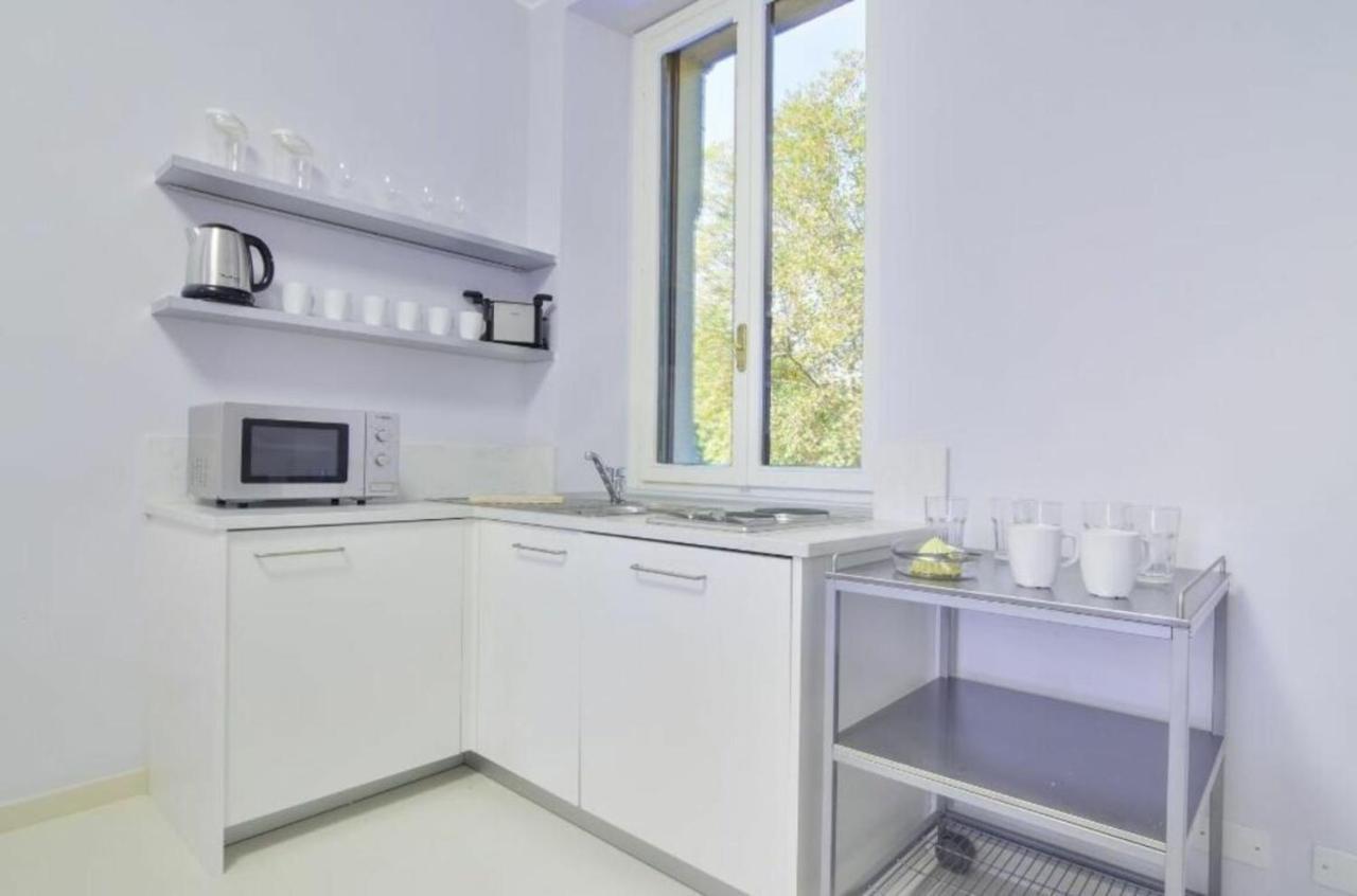 Bacone Liberty Olimpia Appartement Milaan Buitenkant foto